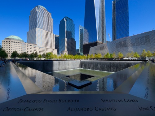 United States, New York, Manhattan, 9/11 Memorial designed by Israeli architect Michael Arad involving a forest of trees around two bodies of water with two large Square holes in their center at the exact spot where the formers towers stood